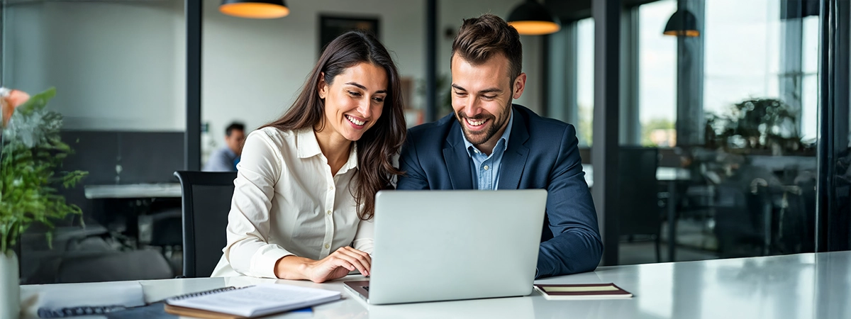 fpo-image Happy couple working together on laptop