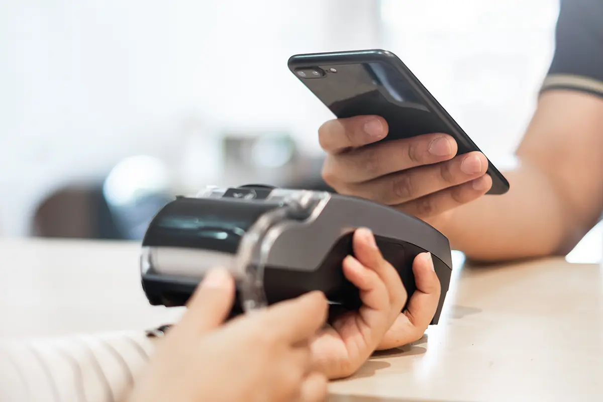 person using a phone for digital payment