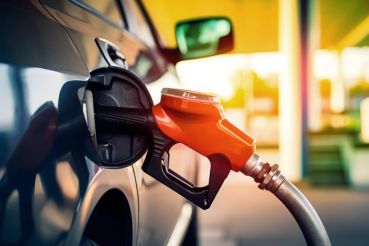 gas pump fueling a vehicle