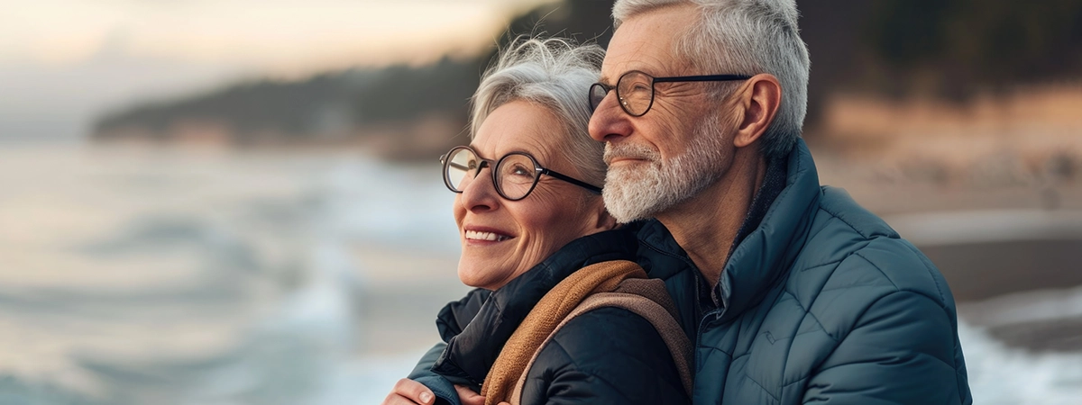 happy couple watching sunset