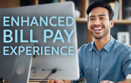 Bill Pay Updates-3 enhanced bill pay experience. young man at a desktop computer